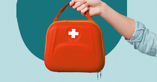 First aid kit in hand