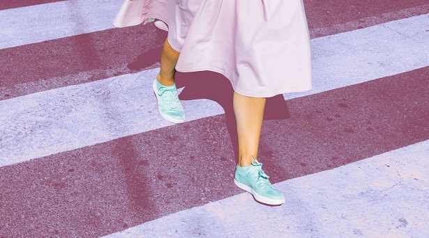 woman walkin in dress and orthotic friendly shoes