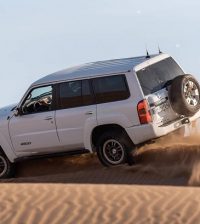 Nissan Patrol driven in a desert