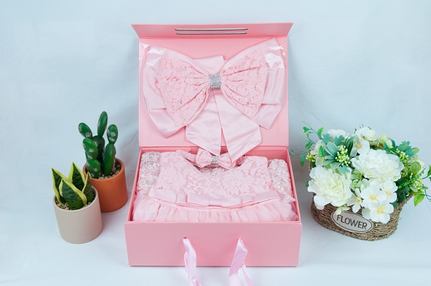 gift box of newborn girl clothes