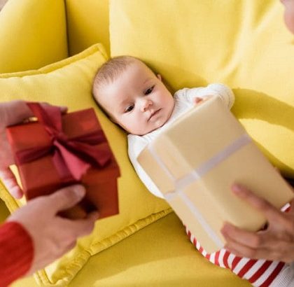 people bringing gifts to a baby
