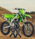 A green motocross dirt bike with quality aftermarket plastics